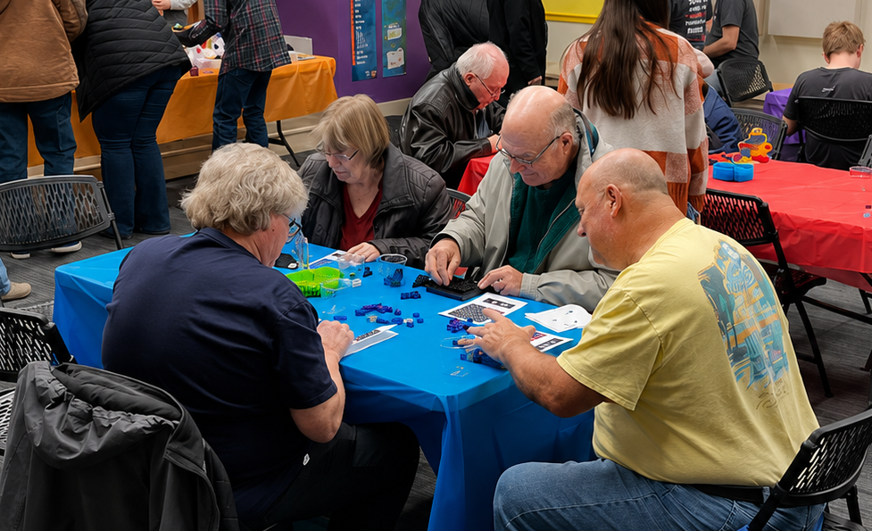 Victory of the Lamb attendees building LEGO mosaic sections together at the vision-reveal event